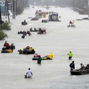 Flooded streets in Houston with victims in rafts