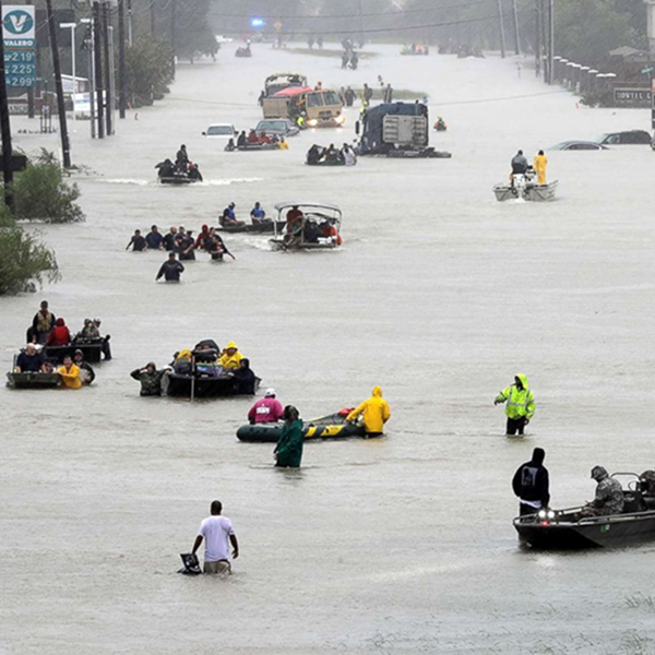 Flooded streets in Houston with victims in rafts