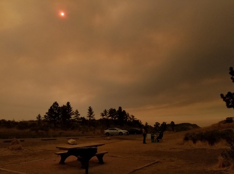 Smoke filled air above a picnic area