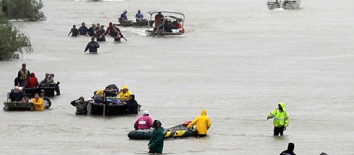 Flooded streets in Houston with victims in rafts