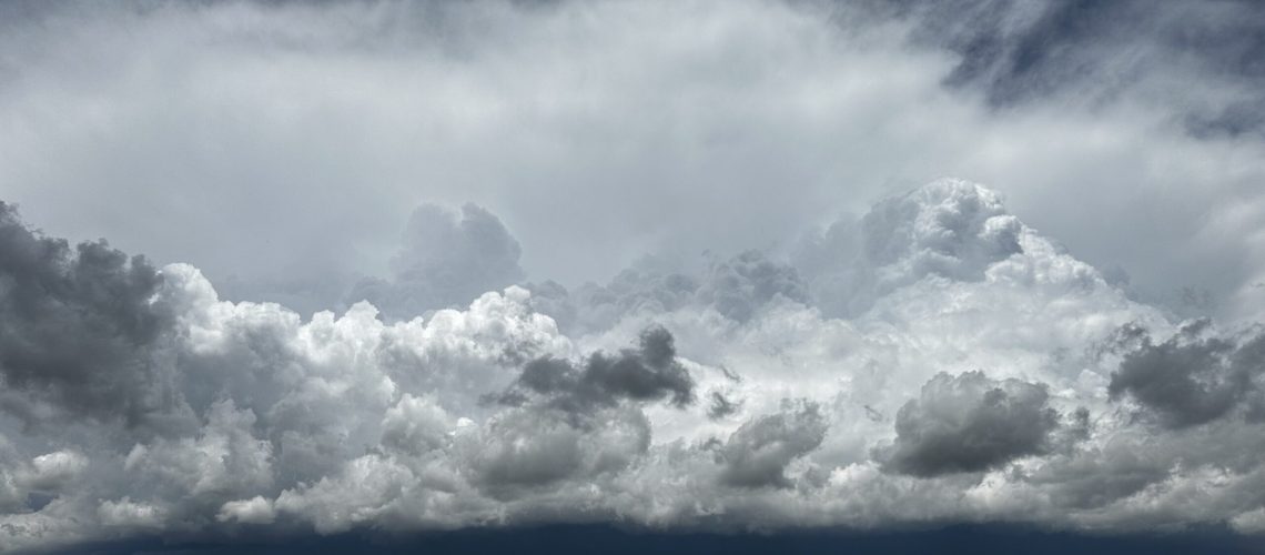 Clouds associated with a rain event in the distance  in eastern Colorado, photo by Erin Sherman